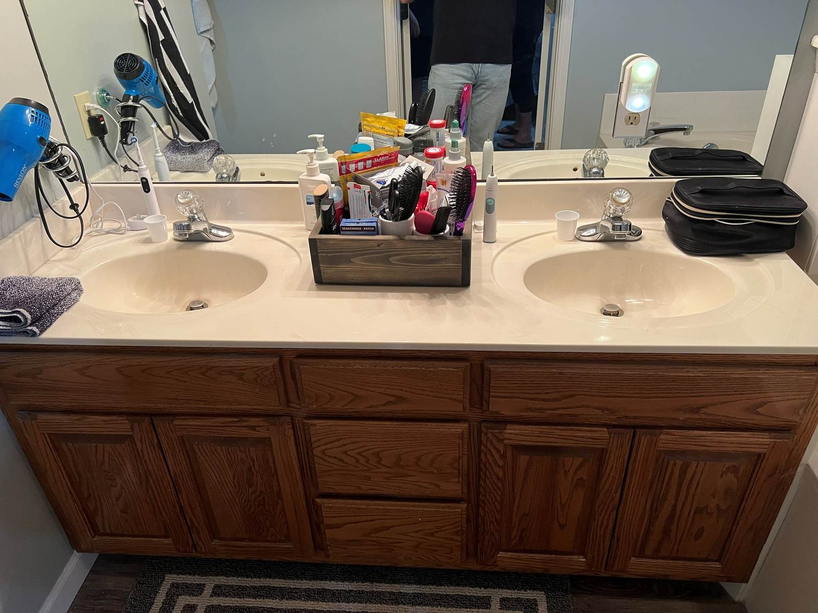 Before: the oak double vanity with a cultured-marble top in an east Tulsa master bathroom we remodeled