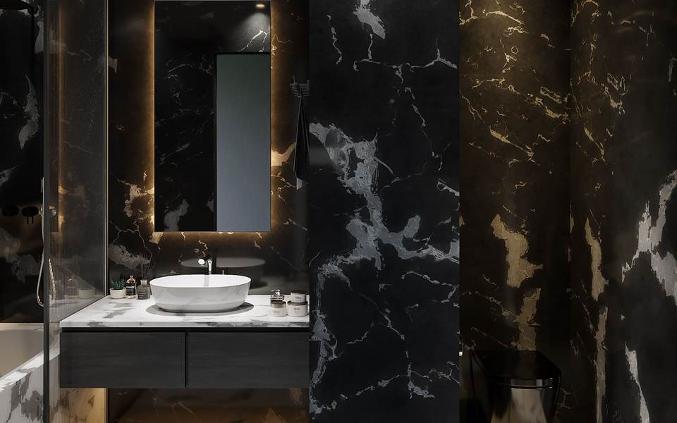 Single-user restroom with black marble-look walls, a backlit mirror and a vessel sink on a floating vanity