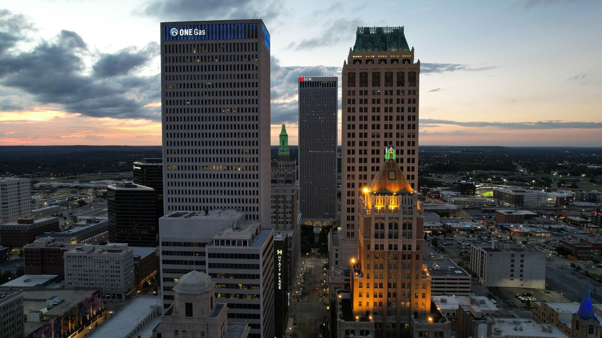 Downtown Tulsa skyline at twilight, seen from above